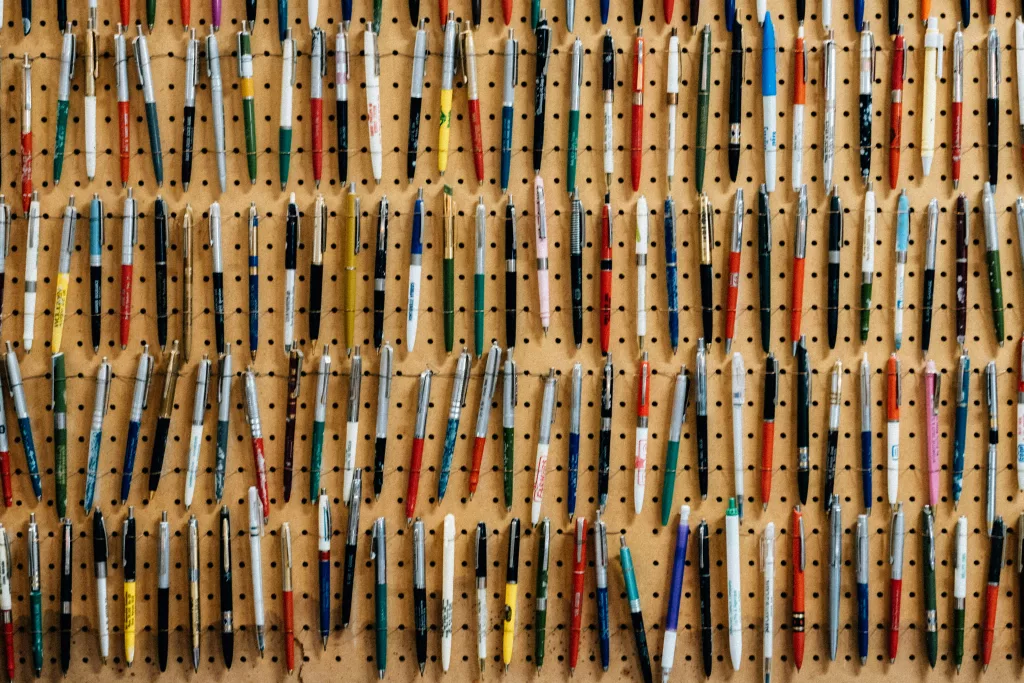 pens on a board