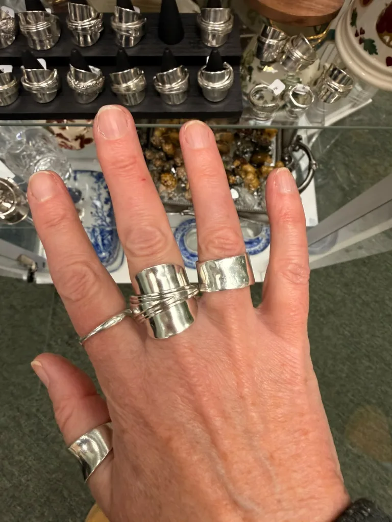Silver-plate spoon rings for sale at Antiques on High, Bowness