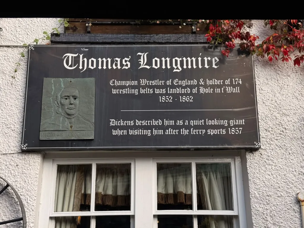 Plaque to Thomas Longmire, champion wrestler and landlord of the Hole in t' Wall