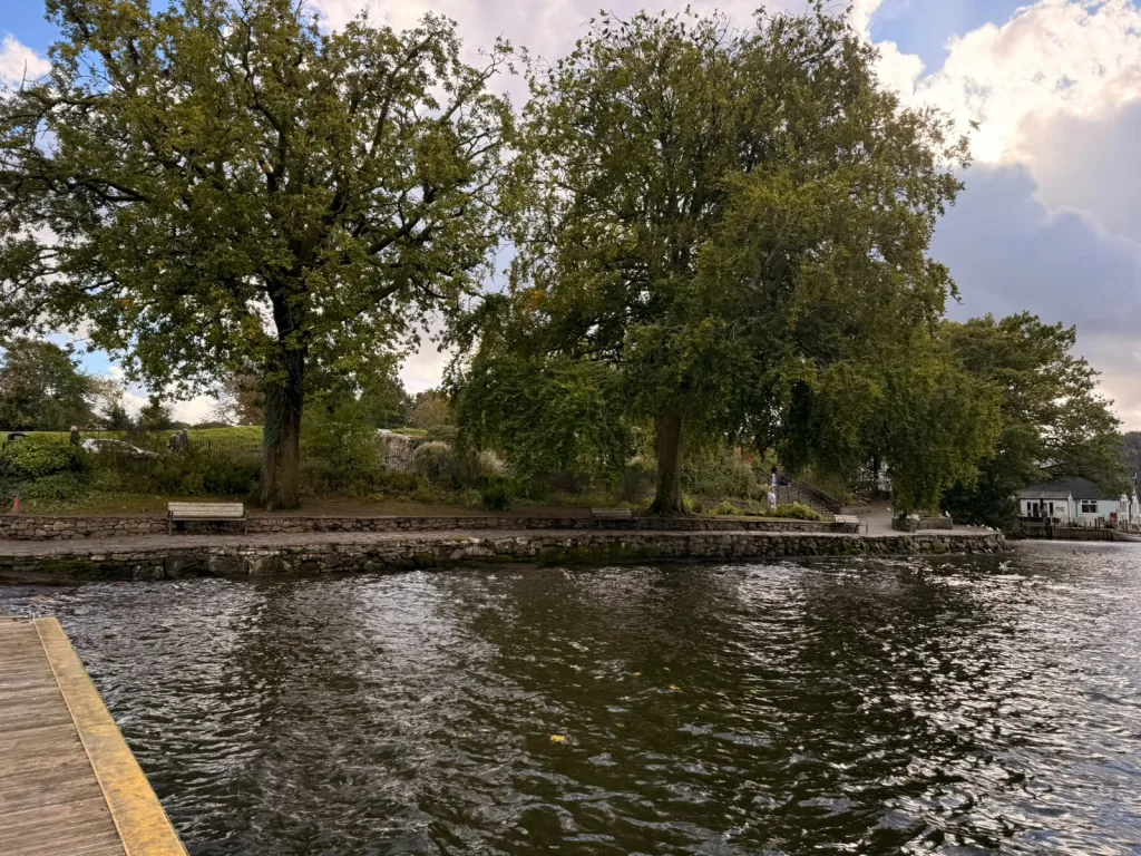 Quiet lakeside benches under the trees at Bowness Bay