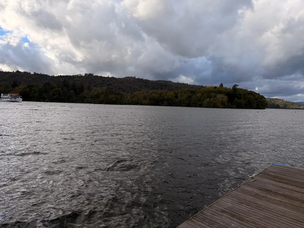 Choppy water on Windermere looking across to the wooded island from Bowness